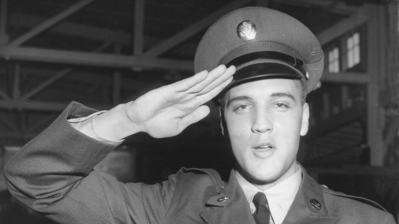 Elvis saluting in military uniform