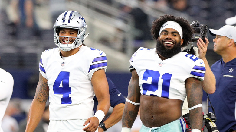 Ezekiel Elliott and Dak Prescott smiling like best buds