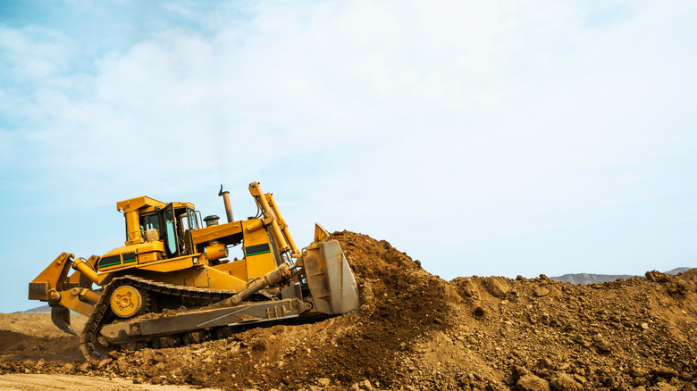 Bulldozer clearing land