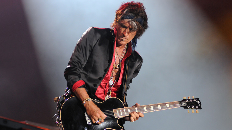 Joe Perry playing guitar