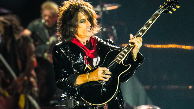 Joe Perry playing guitar