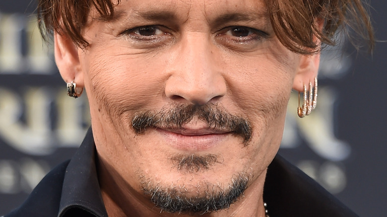 Johnny Depp earrings moustache goatee