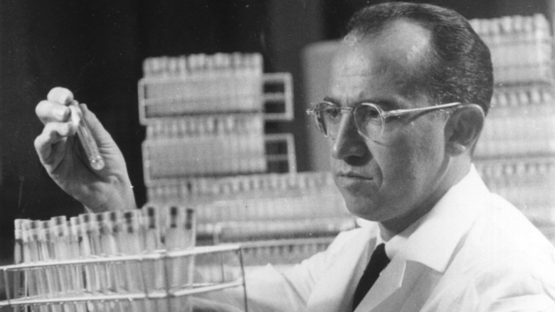 Jonas Salk working in lab