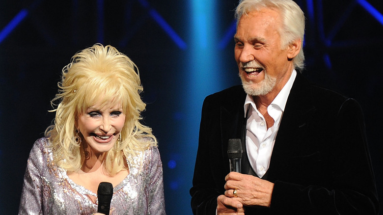 kenny rogers and dolly parton on stage laughing