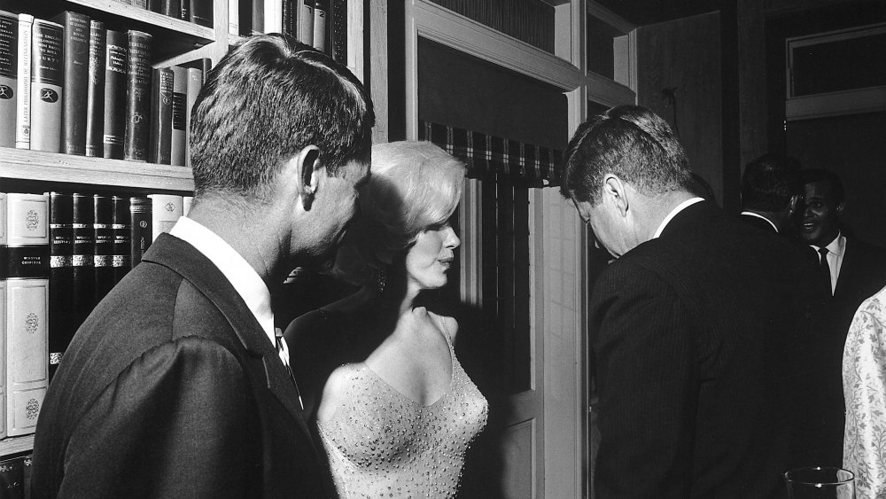 Marilyn Monroe with John and Robert Kennedy