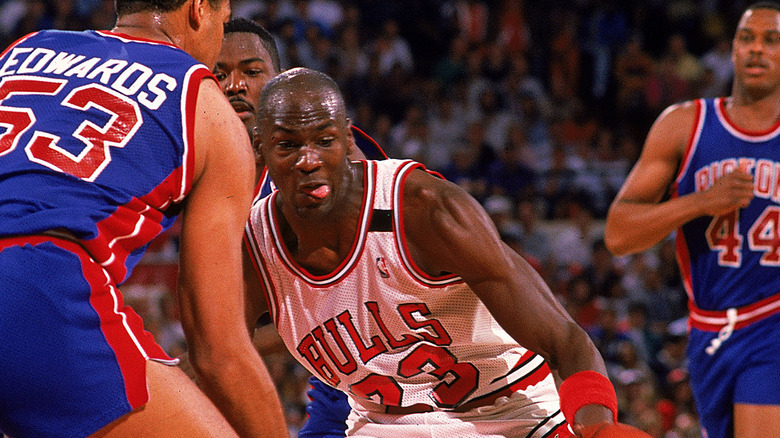 Michael Jordan drives against James Edwards