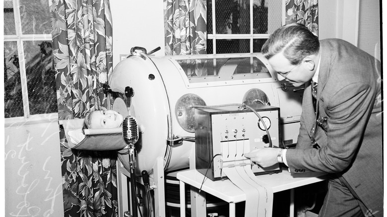 doctor with child in iron lung 