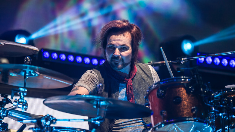 Rikki Rockett playing drums