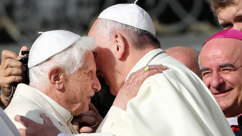 popes francis and benedict in an embrace