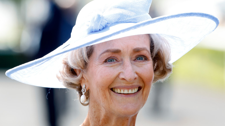 Penelope Knatchbull smiling in hat