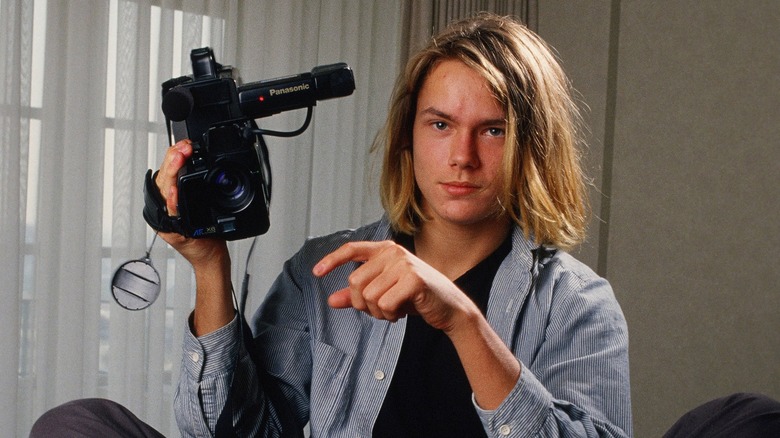 River Phoenix with camera