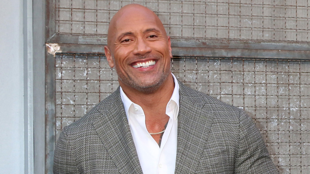 Dwayne Johnson smiles for camera