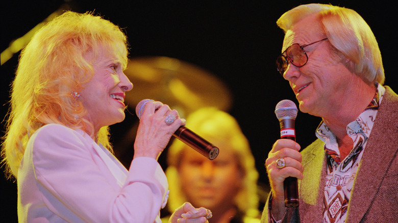 Tammy Wynette and George Jones singing 