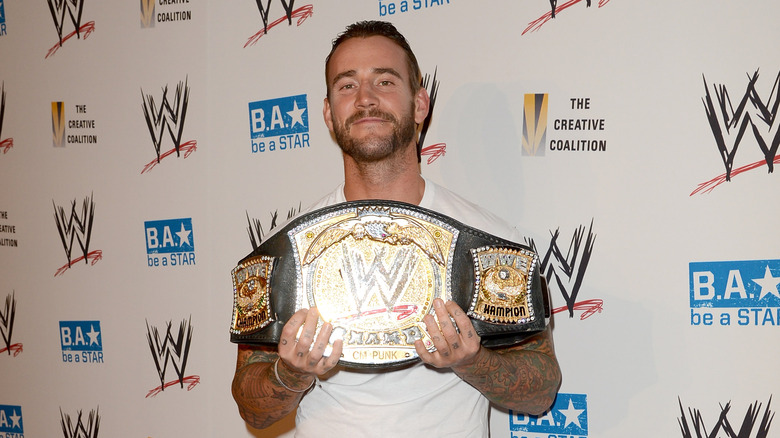 CM Punk WWE Championship title