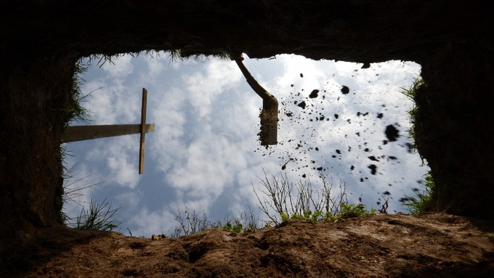 Grave being filled