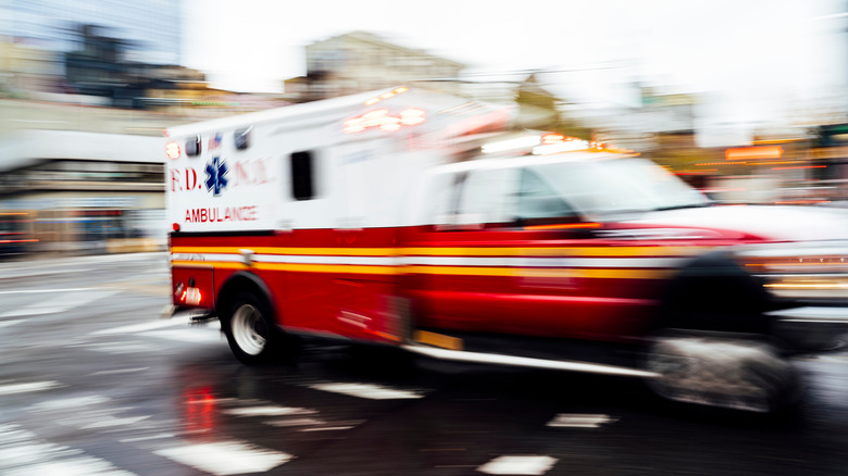 blurred ambulance driving