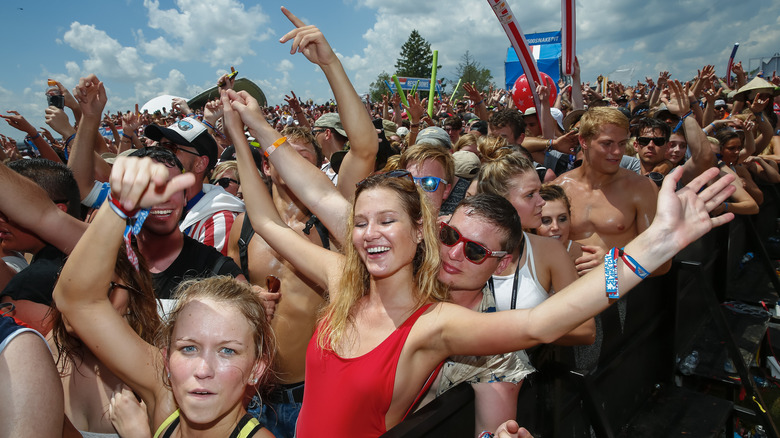 people celebrating at the snake pit