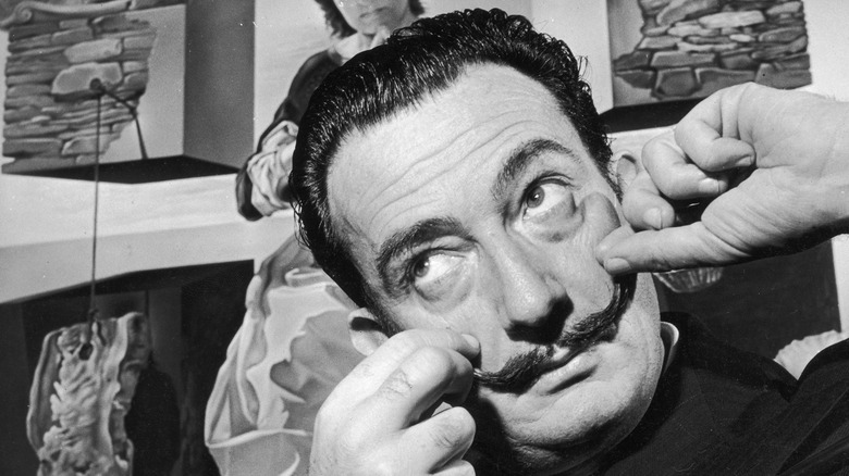 Salvador Dalí twisting mustache