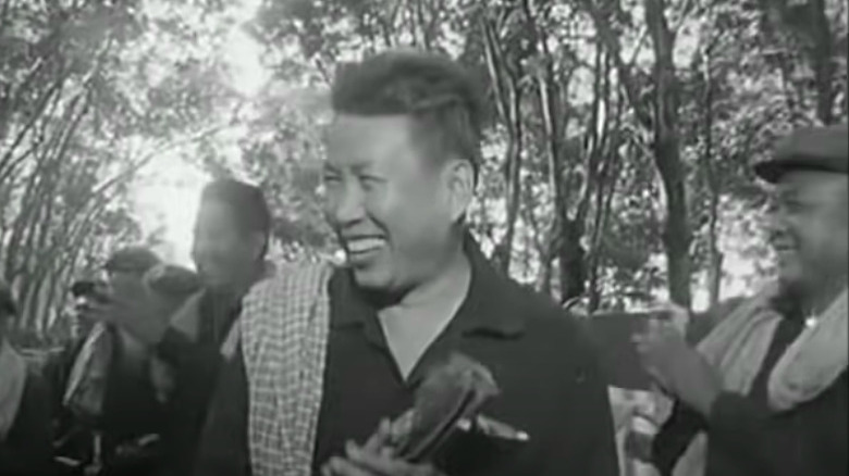 Pol Pot meeting with workers smiling