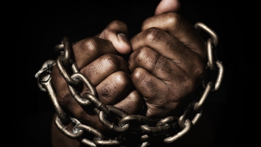 Slave hands in chains