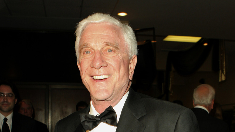 Leslie Nielsen smiling in tuxedo