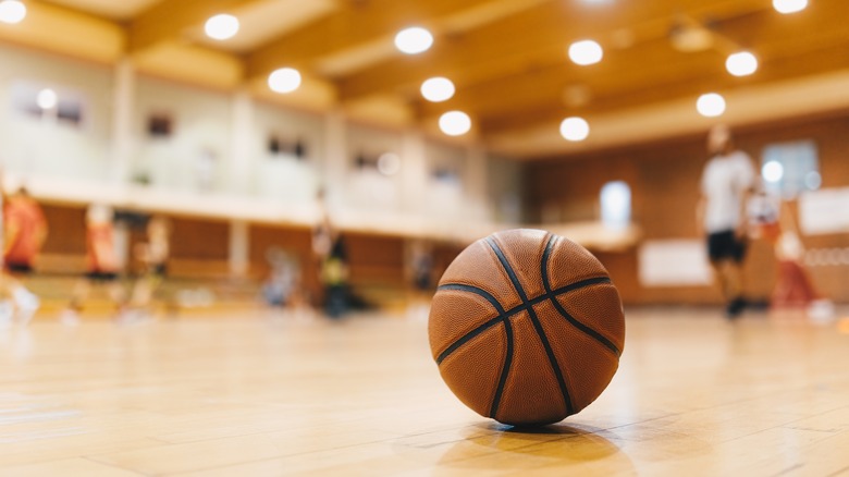 Men playing basketball