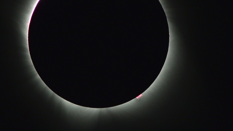 Bright red solar prominence seen during a total solar eclipse