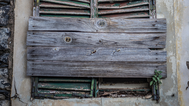 boarded up window