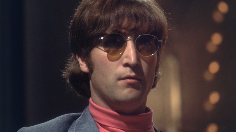 John Lennon wearing sunglasses