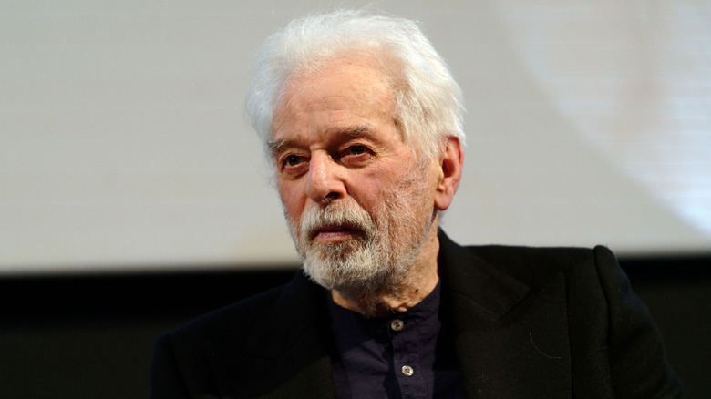 Alejandro Jodorowsky looking to the side