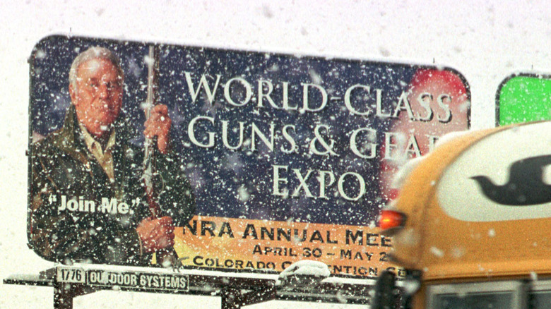 Snow falls around NRA's billboard