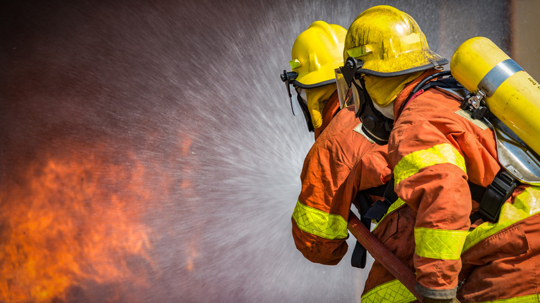 Firefighters battle flames