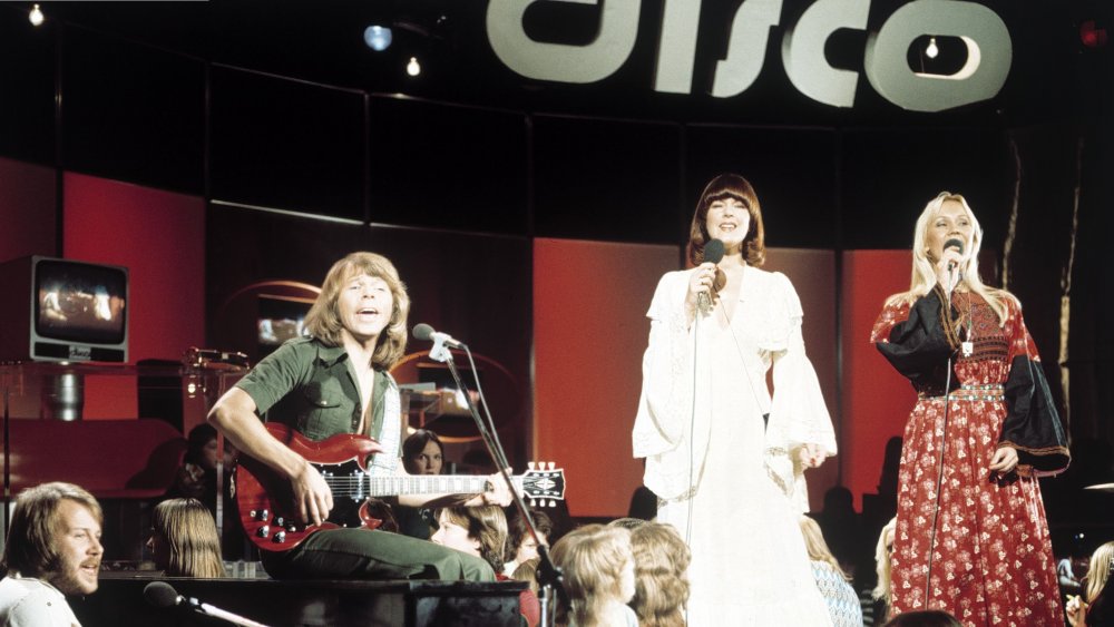 ABBA under a DISCO sign