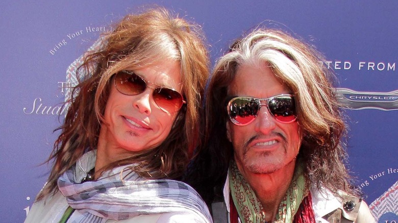 Steven Tyler and Joe Perry smiling