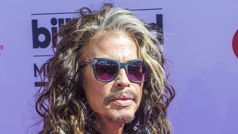 Steven Tyler wearing sunglasses