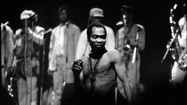 Fela Kuti on stage with joint