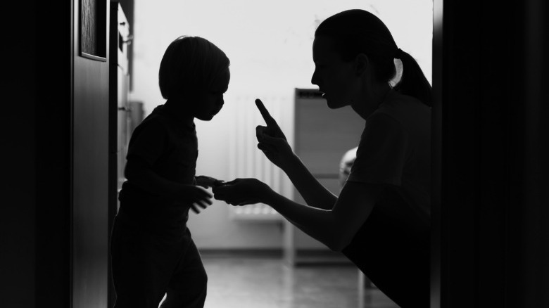 silhouette of mother and son