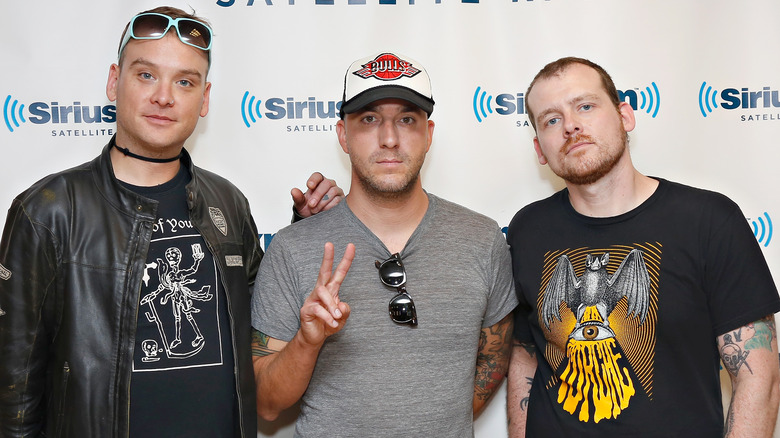 Alkaline Trio posing for photo