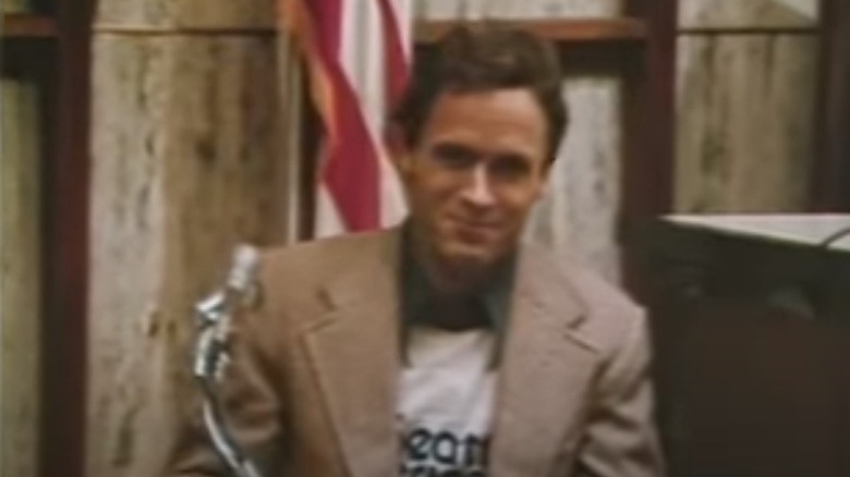 Ted Bundy smiles for the cameras