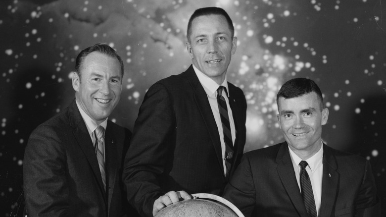 James Lovell, Jack Swigert, Fred Haise, suits smiling together