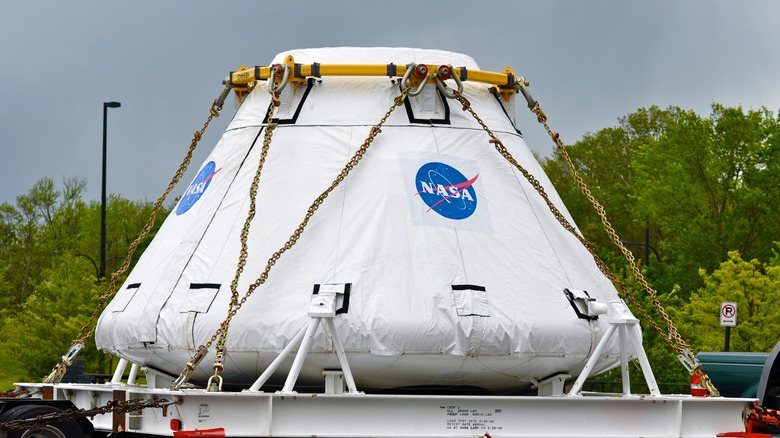 NASA space capsule chained down