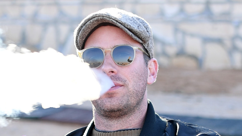 Armie Hammer smoking