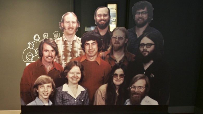 Cardboard cutouts of the Microsoft team