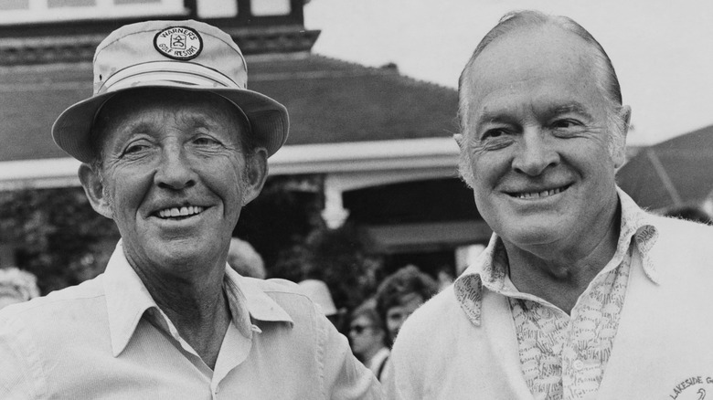 Bing Crosby smiling with Bob Hope