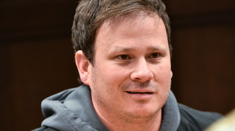 Tom DeLonge smiling