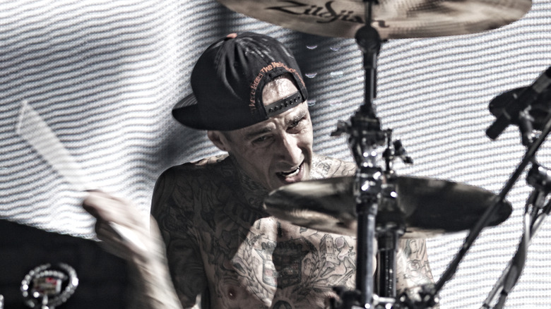 Travis Barker playing drums