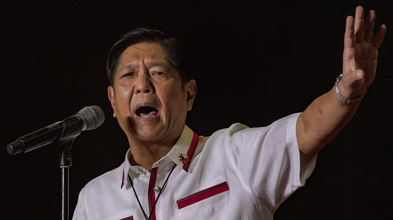 Bongbong Marcos raises left arm