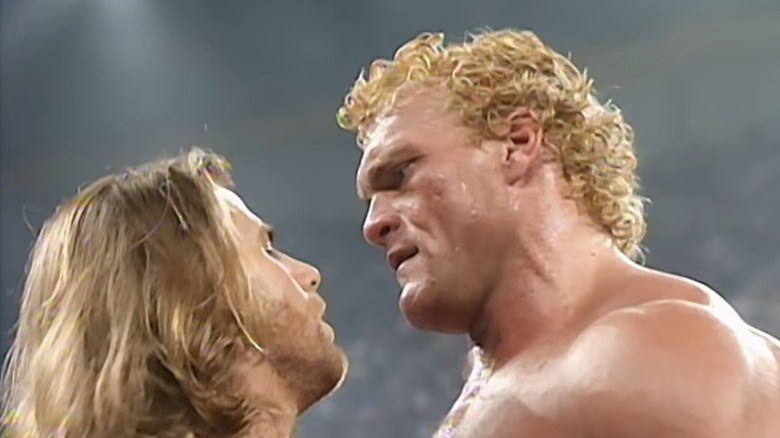 Sycho Sid staring down Shawn Michaels