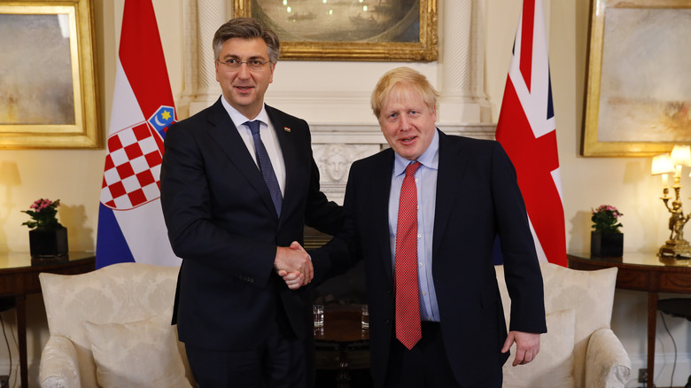 Boris Johnson shakes hands with Croatia's Prime Minister Andrej Plenkovic