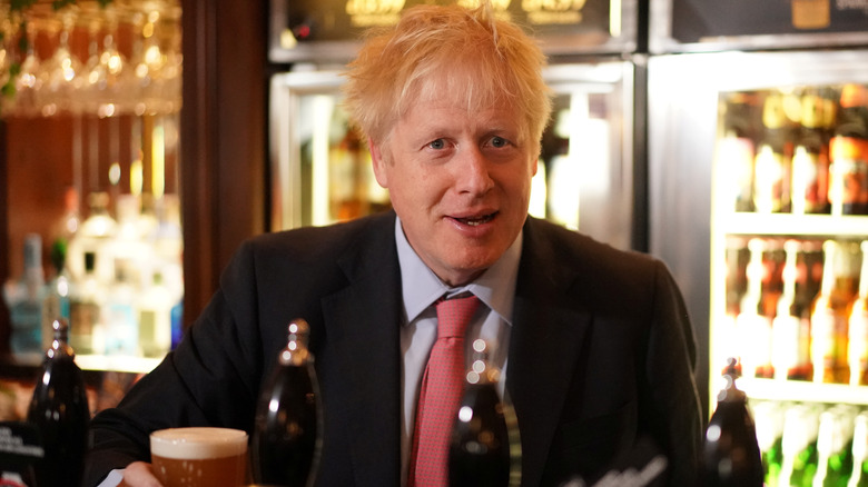 Boris Johnson has a beer